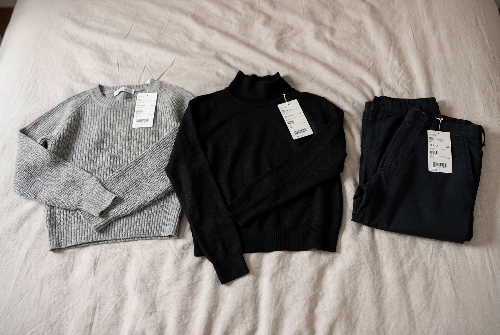 Clothes with price tags still attached — a familiar sight in many closets